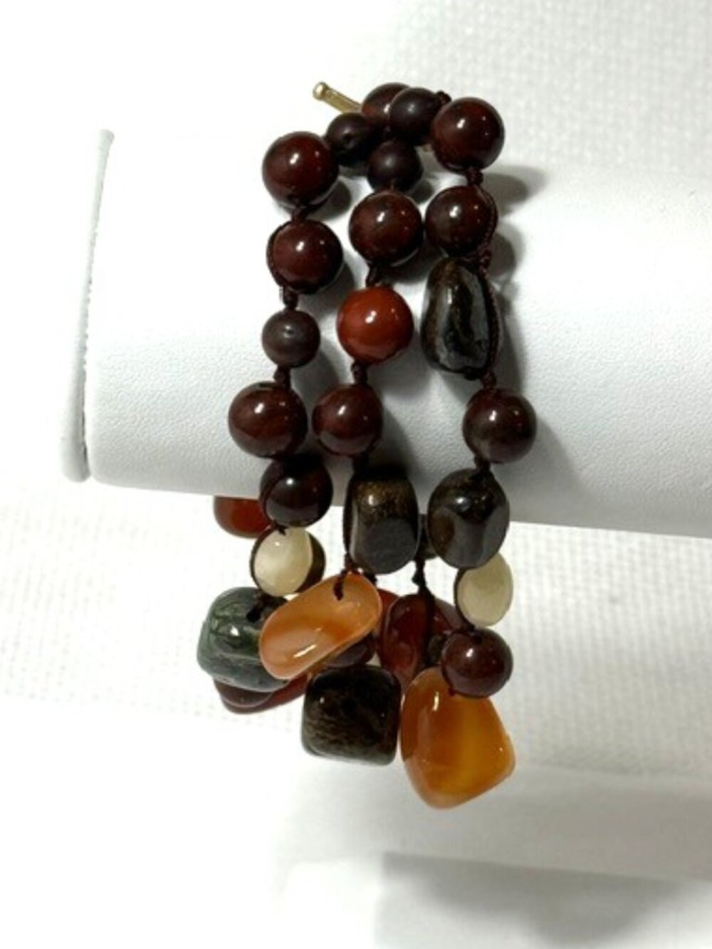 Three-strand polished stone 7" bracelet.